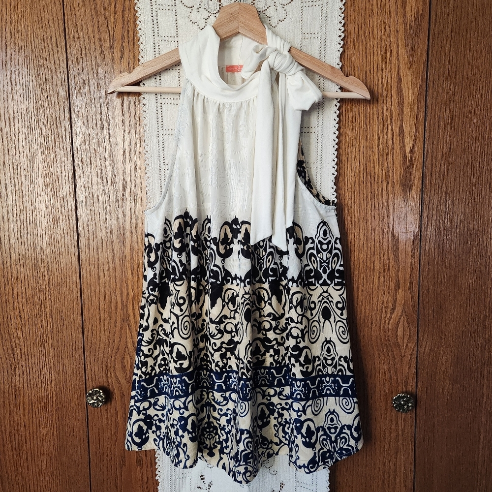 Simply Aster Sleeveless Halter Top With Floral Pattern